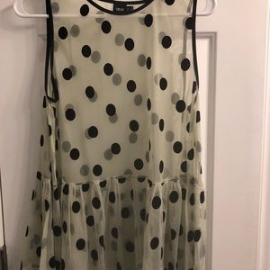 Sheer polka dot top. Cute over a cami